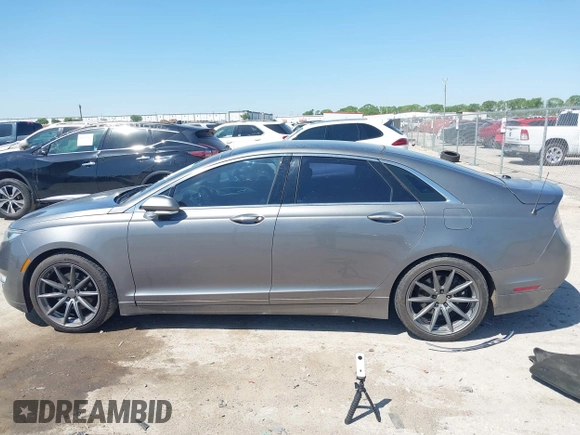 2014 Lincoln MKZ z VIN 3LN6L2G92ER835456, wystawiony jako IAAI lot #41985573 z przebiegiem 174 080 mil mil oraz . Historia ofert i sprzedaży dostępna na DreamBid. Obrazek 14.