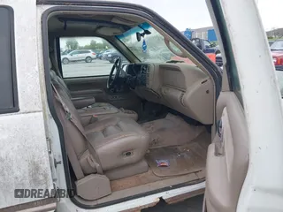 1997 GMC Yukon with VIN 1GKEK13R2VJ739795, listed as a IAAI auction lot 42011678 with 185,306 mi miles. Bid and sale history available at carsss.com. Image 5.