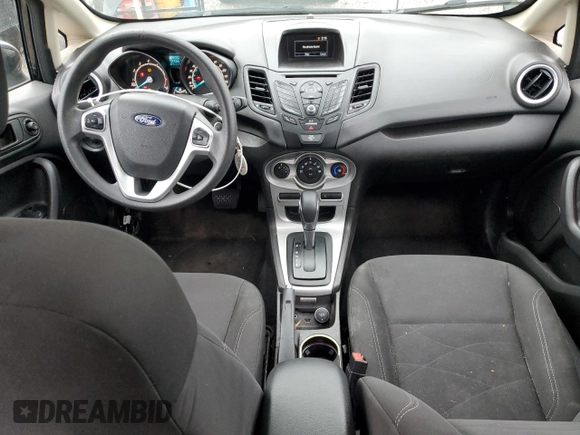 2018 Ford Fiesta SE with VIN 3FADP4EJ9JM105808, listed as a Copart auction lot 87927755 with 104,055 mi miles and Salvage Title. Bid and sale history available at DreamBid. Image 8.