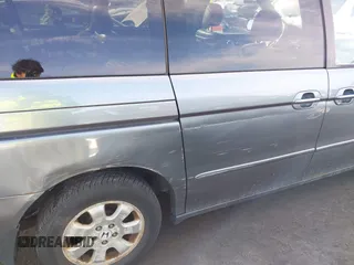 2002 Honda Odyssey EX-L z VIN 5FNRL180X2B022889, wystawiony jako IAAI lot #41546405 z przebiegiem 162 395 mil mil oraz . Historia ofert i sprzedaży dostępna na DreamBid. Obrazek 6.