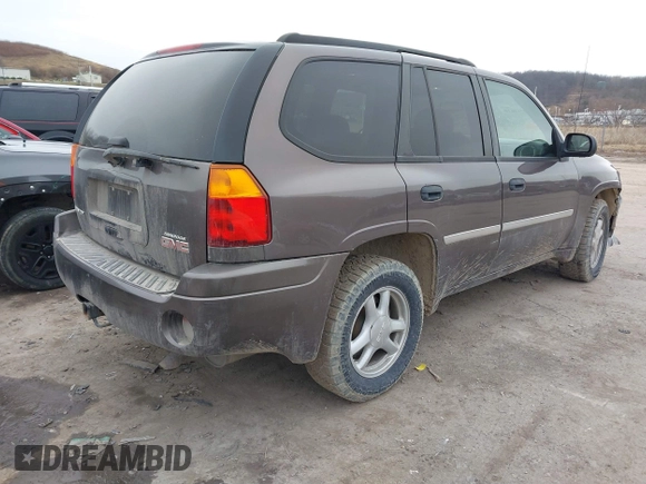 2008 GMC Envoy SLE2 with VIN 1GKDT13S482236375, listed as a IAAI auction lot 41510610 with 183,716 mi miles. Bid and sale history available at carsss.com. Image 4.