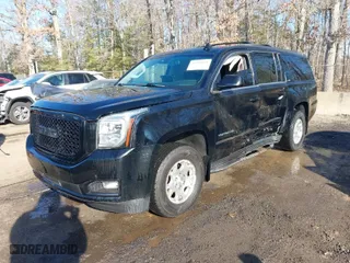 2017 GMC Yukon XL SLT with VIN 1GKS2GKC7HR285648, listed as a IAAI auction lot 41389631 with 84,989 mi miles. Bid and sale history available at carsss.com. Image 2.
