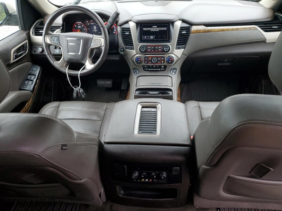 2016 GMC Yukon Denali with VIN 1GKS1CKJ0GR246179, listed as a Copart auction lot 52033135 with 151,442 mi miles and Clean Title. Bid and sale history available at carsss.com. Image 8.