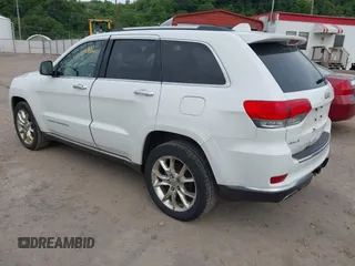 2014 Jeep Grand Cherokee Summit z VIN 1C4RJFJTXEC346627, wystawiony jako IAAI lot #42332200 z przebiegiem 231 007 mil mil oraz . Historia ofert i sprzedaży dostępna na DreamBid. Obrazek 3.