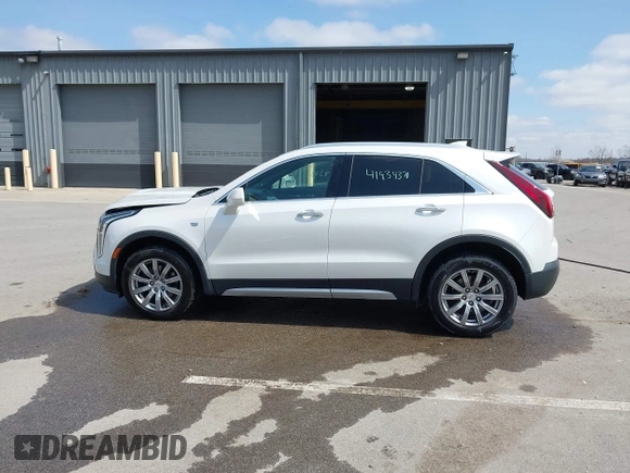 2020 Cadillac XT4 AWD Premium Luxury z VIN 1GYFZDR44LF036461, wystawiony jako IAAI lot #41934371 z przebiegiem 90 545 mil mil oraz . Historia ofert i sprzedaży dostępna na DreamBid. Obrazek 14.