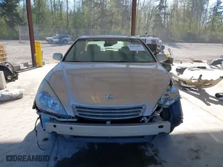 2004 Lexus ES 330 with VIN JTHBA30G340003869, listed as a IAAI auction lot 42024907 with 240,425 mi miles. Bid and sale history available at carsss.com. Image 13.
