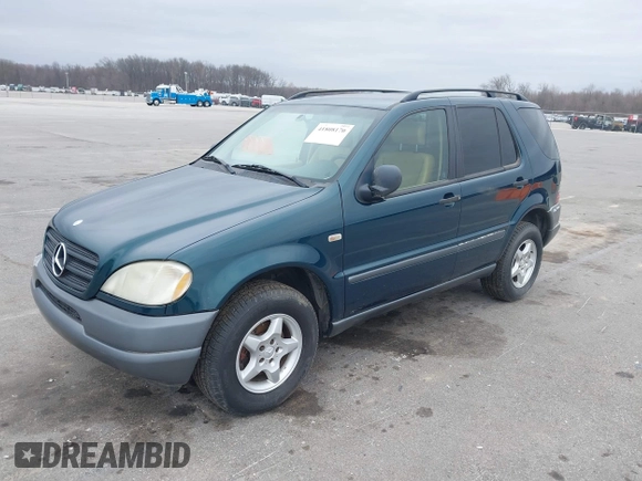 1999 Mercedes-Benz M 320/430/500 with VIN 4JGAB54E8XA055359, listed as a IAAI auction lot 41808170 with 161,573 mi miles and . Bid and sale history available at DreamBid. Image 2.