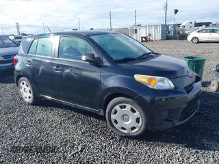 2011 Scion xD with VIN JTKKU4B43B1011178, listed as a IAAI auction lot 41892710 with Not Provided miles. Bid and sale history available at carsss.com. Image 1.