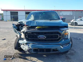 2023 Ford F-150 XL with VIN 1FTEW1CP7PKD30770, listed as a IAAI auction lot 41691526 with 3,000 mi miles. Bid and sale history available at carsss.com. Image 6.