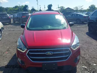 2017 Ford Escape SE z VIN 1FMCU9GD4HUA10240, wystawiony jako IAAI lot #42392522 z przebiegiem 82 325 mil mil oraz . Historia ofert i sprzedaży dostępna na DreamBid. Obrazek 12.