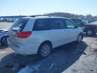 2008 Toyota Sienna XLE with VIN 5TDZK22C18S174818, listed as a IAAI auction lot 41906039 with 249,182 mi miles. Bid and sale history available at carsss.com. Image 4.