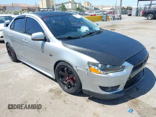 2010 Mitsubishi Lancer GTS z VIN JA32U8FW6AU017479, wystawiony jako IAAI lot #42489590 z przebiegiem 171 510 mil mil oraz . Historia ofert i sprzedaży dostępna na DreamBid. Obrazek 1.