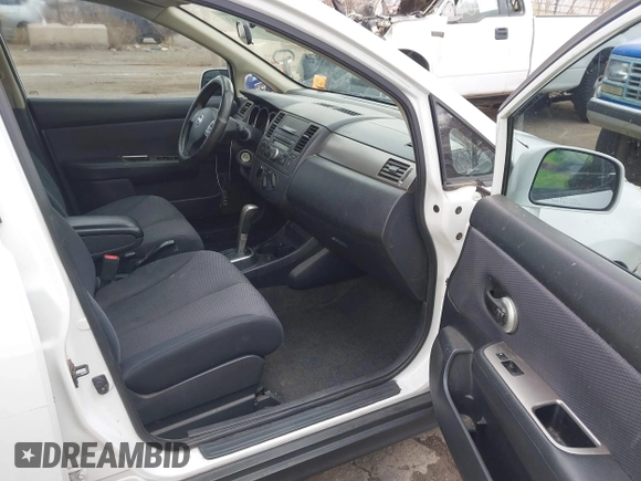2008 Nissan Versa 1.8 S with VIN 3N1BC13E18L354964, listed as a IAAI auction lot 41581663 with 134,321 mi miles. Bid and sale history available at carsss.com. Image 5.
