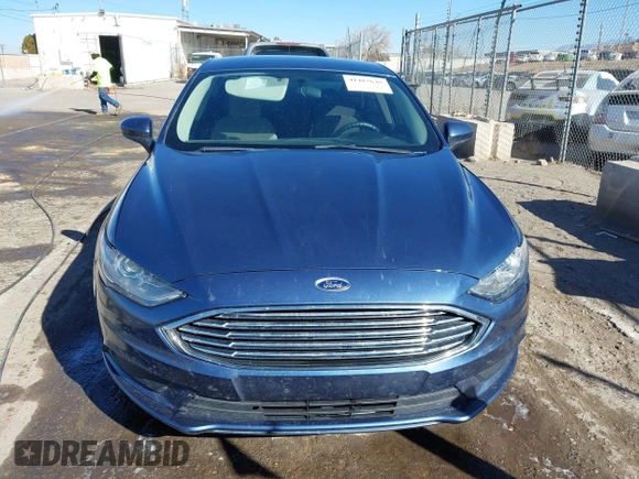 2018 Ford Fusion S with VIN 3FA6P0G77JR129224, listed as a IAAI auction lot 41483648 with 104,045 mi miles. Bid and sale history available at carsss.com. Image 12.