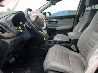 2017 Honda CR-V Touring with VIN 5J6RW2H97HL060219, listed as a Copart auction lot 45497645 with 144,724 mi miles and Salvage Title. Bid and sale history available at carsss.com. Image 7.