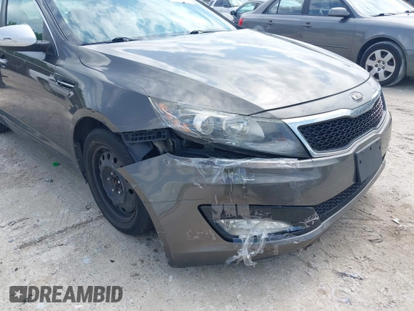 2013 Kia Optima EX z VIN 5XXGN4A77DG251606, wystawiony jako IAAI lot #42377401 z przebiegiem 135 067 mil mil oraz . Historia ofert i sprzedaży dostępna na DreamBid. Obrazek 6.