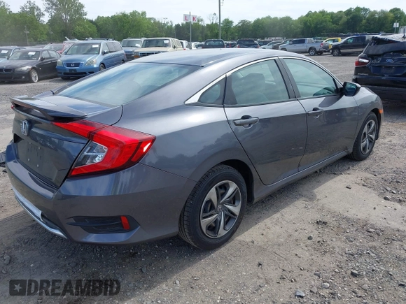 2021 Honda Civic LX with VIN 2HGFC2F65MH525423, listed as a IAAI auction lot 42319862 with 37,248 mi miles and . Bid and sale history available at DreamBid. Image 4.