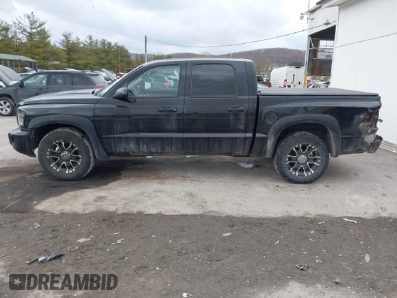 2011 Ram Dakota Bighorn/Lonestar with VIN 1D7RW3GK6BS611095, listed as a IAAI auction lot 41433067 with 137,638 mi miles. Bid and sale history available at carsss.com. Image 14.