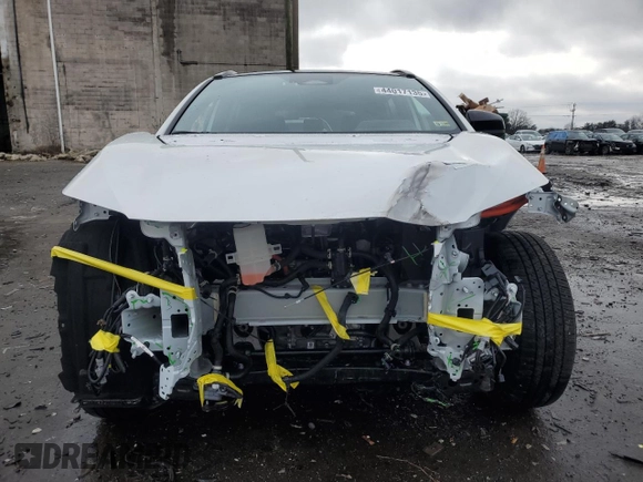 2024 Toyota bZ4X XLE with VIN JTMABACA4RA079253, listed as a Copart auction lot 44017135 with 2,445 mi miles and Salvage Title. Bid and sale history available at DreamBid. Image 5.