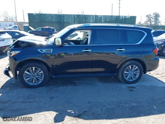 2023 Infiniti QX80 LUXE with VIN JN8AZ2AE3P9303090, listed as a IAAI auction lot 41659443 with 27,699 mi miles. Bid and sale history available at carsss.com. Image 14.