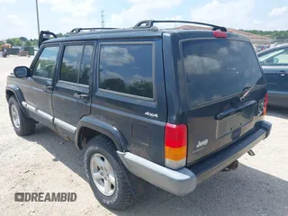 2000 Jeep Cherokee z VIN 1J4FF48S7YL273642, wystawiony jako IAAI lot #42743391 z przebiegiem 200 780 mil mil oraz . Historia ofert i sprzedaży dostępna na DreamBid. Obrazek 3.