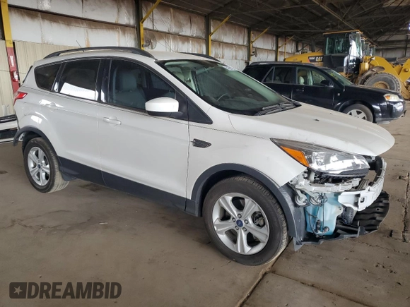 2015 Ford Escape SE with VIN 1FMCU9GX2FUB49175, listed as a Copart auction lot 54582125 with 90,544 mi miles and Salvage Title. Bid and sale history available at DreamBid. Image 4.