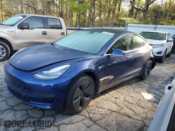 2019 Tesla Model 3 Mid Range z VIN 5YJ3E1EA2KF476194, wystawiony jako Copart lot #51140115 z przebiegiem Nie podano mil oraz Szkoda całkowita • Salvage title. Historia ofert i sprzedaży dostępna na DreamBid. Obrazek 1.
