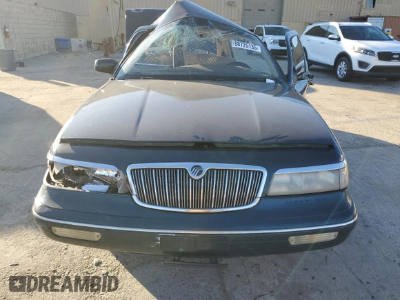 1997 Mercury Grand Marquis LS with VIN 2MELM75W2VX638121, listed as a Copart auction lot 88725135 with 135,475 mi miles and Salvage Title. Bid and sale history available at DreamBid. Image 5.