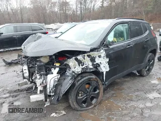 2019 Jeep Compass Latitude with VIN 3C4NJDBB1KT601609, listed as a IAAI auction lot 41931381 with Not provided miles and . Bid and sale history available at DreamBid. Image 2.
