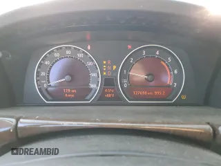 2007 BMW 7 Series 750i with VIN WBAHL83507DT07958, listed as a Copart auction lot 73318944 with 127,698 mi miles and Salvage Title. Bid and sale history available at carsss.com. Image 9.