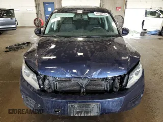 2013 Volkswagen Tiguan SE with VIN WVGBV7AX4DW518545, listed as a Copart auction lot 64585175 with 104,030 mi miles and Salvage title. Bid and sale history available at DreamBid. Image 5.