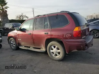 2003 GMC Envoy SLE with VIN 1GKDS13S732335607, listed as a Copart auction lot 85300374 with 305,651 mi miles and Salvage Title. Bid and sale history available at carsss.com. Image 2.