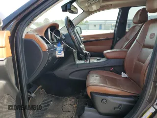 2011 Jeep Grand Cherokee Overland Summit with VIN 1J4RR6GT3BC686143, listed as a Copart auction lot 59218685 with 155,059 mi miles and Salvage title. Bid and sale history available at DreamBid. Image 7.