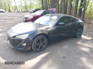 2013 Scion FR-S with VIN JF1ZNAA12D1718693, listed as a IAAI auction lot 42077260 with 110,164 mi miles. Bid and sale history available at carsss.com. Image 17.