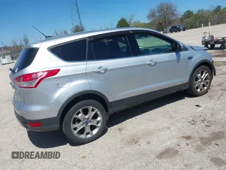2013 Ford Escape SEL z VIN 1FMCU9H93DUA34811, wystawiony jako IAAI lot #42227559 z przebiegiem 126 495 mil mil oraz . Historia ofert i sprzedaży dostępna na DreamBid. Obrazek 4.