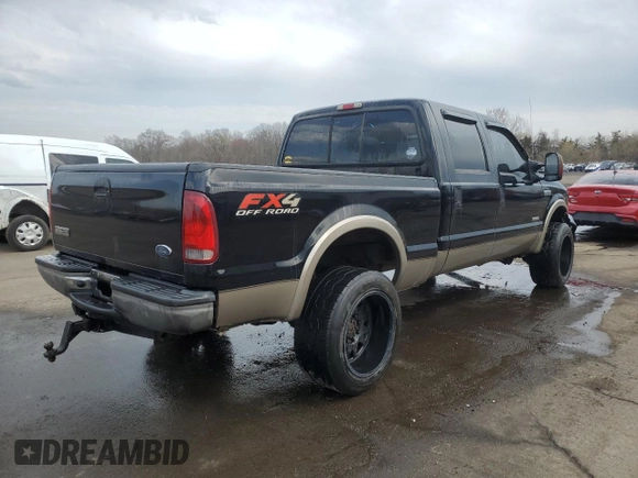 2005 Ford F-350 XL with VIN 1FTWW31P05EC09657, listed as a Copart auction lot 51969665 with 158,206 mi miles and Salvage Title. Bid and sale history available at DreamBid. Image 3.