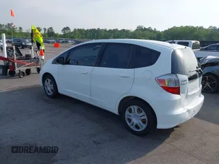 2010 Honda Fit with VIN JHMGE8H22AS022221, listed as a IAAI auction lot 42009796 with 101,904 mi miles. Bid and sale history available at carsss.com. Image 3.