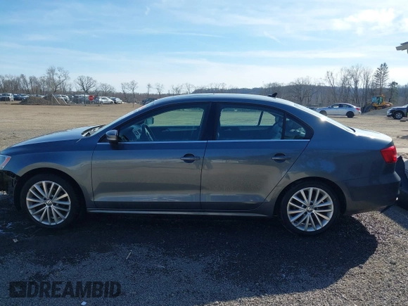 2015 Volkswagen Jetta Sedan 1.8T SE w/Connectivity with VIN 3VWD07AJ2FM312146, listed as a IAAI auction lot 41843238 with 107,741 mi miles. Bid and sale history available at carsss.com. Image 14.