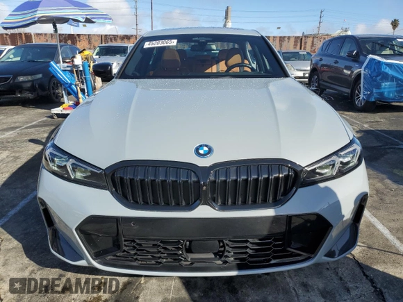 2023 BMW 3 Series 330e with VIN 3MW39FF07P8D26890, listed as a Copart auction lot 45203065 with 21,679 mi miles and Salvage Title. Bid and sale history available at carsss.com. Image 5.