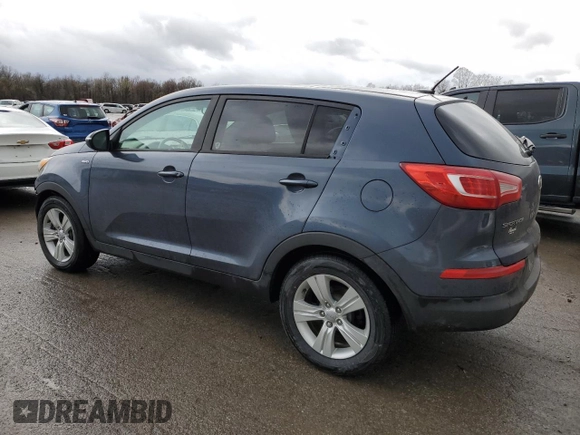 2012 Kia Sportage LX with VIN KNDPBCA25C7285039, listed as a Copart auction lot 52620735 with 197,305 mi miles and Salvage title. Bid and sale history available at DreamBid. Image 2.