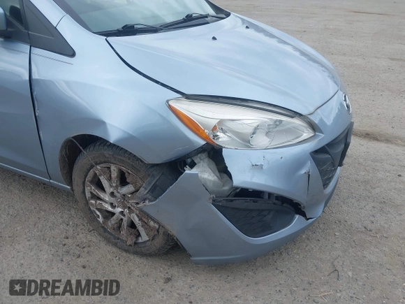 2012 Mazda 5 Sport with VIN JM1CW2BLXC0127258, listed as a IAAI auction lot 42226885 with 112,102 mi miles and . Bid and sale history available at DreamBid. Image 6.