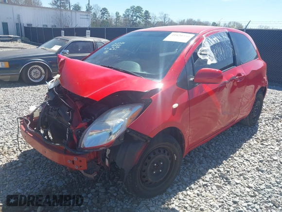2011 Toyota Yaris with VIN JTDJT4K30B5332648, listed as a IAAI auction lot 41820350 with 216,482 mi miles. Bid and sale history available at carsss.com. Image 2.