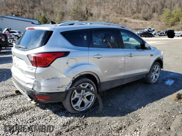 2019 Ford Escape Titanium with VIN 1FMCU9J98KUB53669, listed as a Copart auction lot 47344715 with 84,051 mi miles and Salvage title. Bid and sale history available at DreamBid. Image 3.