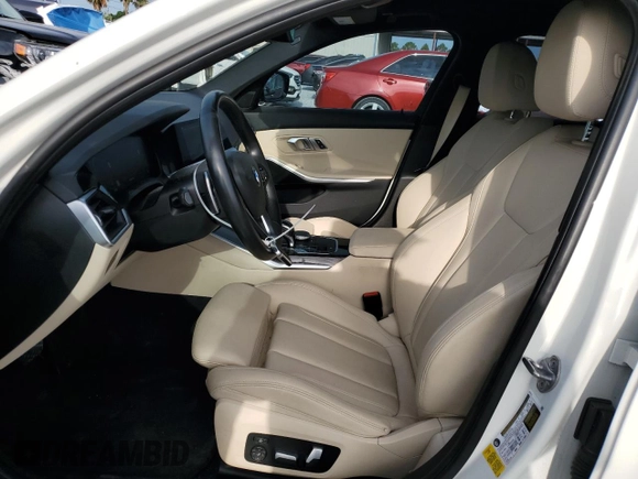 2020 BMW 3 Series 330i with VIN WBA5R1C0XLFH39262, listed as a Copart auction lot 57398585 with 55,456 mi miles and Salvage title. Bid and sale history available at DreamBid. Image 7.