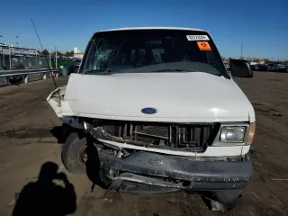 2000 Ford Econoline Cargo with VIN 1FTNS24L6YHB99973, listed as a Copart auction lot 82229594 with 172,734 mi miles and Non Repairable. Bid and sale history available at DreamBid. Image 5.