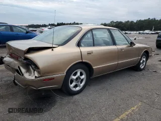 1998 Oldsmobile LSS z VIN 1G3HY52K2W4807516, wystawiony jako Copart lot #87669545 z przebiegiem Nie podano mil oraz Szkody całkowita. Historia ofert i sprzedaży dostępna na DreamBid. Obrazek 3.