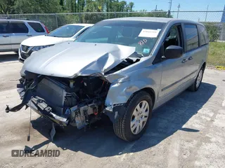 2016 Dodge Grand Caravan SE with VIN 2C4RDGBG9GR385847, listed as a IAAI auction lot 42042755 with 32,613 mi miles and . Bid and sale history available at DreamBid. Image 18.