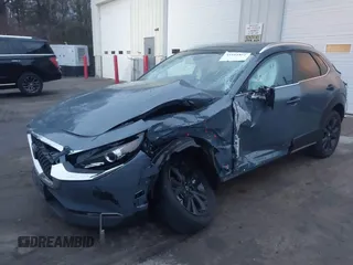 2023 Mazda CX-30 S Carbon Edition with VIN 3MVDMBCM5PM545150, listed as a IAAI auction lot 41104881 with 30,459 mi miles and . Bid and sale history available at DreamBid. Image 2.
