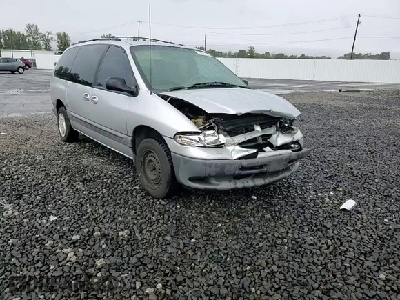 2000 Dodge Caravan SE with VIN 2B4GP44G3YR784939, listed as a Copart auction lot 73253264 with 198,883 mi miles and Salvage Title. Bid and sale history available at DreamBid. Image 12.
