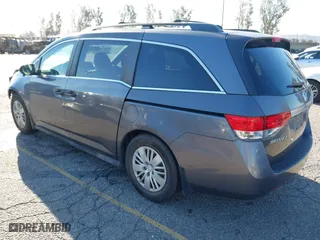 2014 Honda Odyssey LX with VIN 5FNRL5H23EB015067, listed as a IAAI auction lot 41760301 with 167,389 mi miles. Bid and sale history available at carsss.com. Image 3.